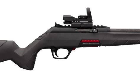 Its extended magazine bumps up the round count to 13. . Winchester wildcat red dot